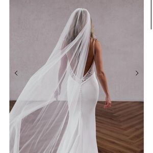 Elegant White Bridal Gown with Veil